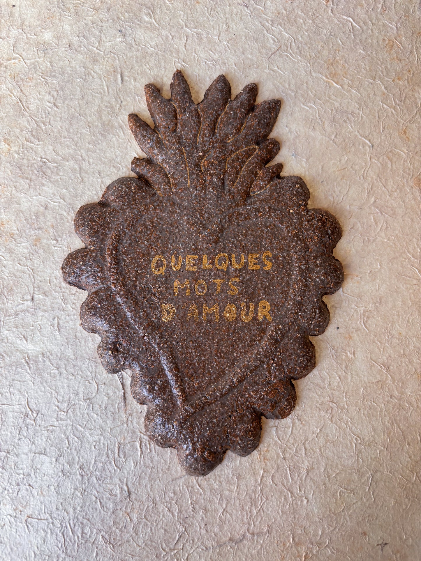 Ex-voto en céramique et or